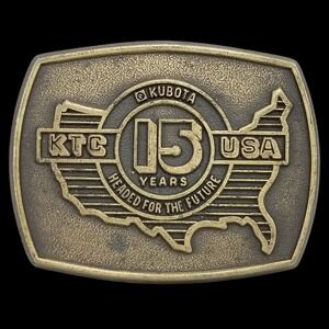 Vintage KTC Kubota USA 15 Years‎ Headed for the Future Brass Belt Buckle